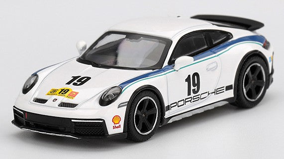 PORSCHE 911 (992) DAKAR RALLYE
DESIGN PACKAGE 74 2024 1:64 Scala 1:64 Mini GT
