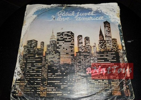 7" 45 tours Patrick Juvet J'AIME L'AMÉRIQUE (partie I)/(partie II) (1978, BRCNP 40086)