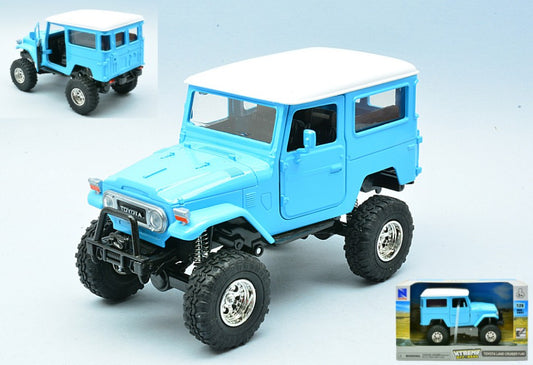 TOYOTA LAND CRUISER FJ40 LIGHT BLUE 1:24 Scala 1:24 New Ray
