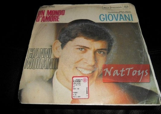 7" 45 GIRI Gianni Morandi UN MONDO D'AMORE/QUESTA VITA CAMBIERA' 1998 - EX/NM