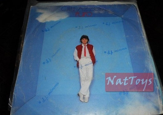 7" 45 GIRI Pupo CIELI AZZURRI/E INVECE NIENTE (Italy 1983, CGD 10449) - NM/NM