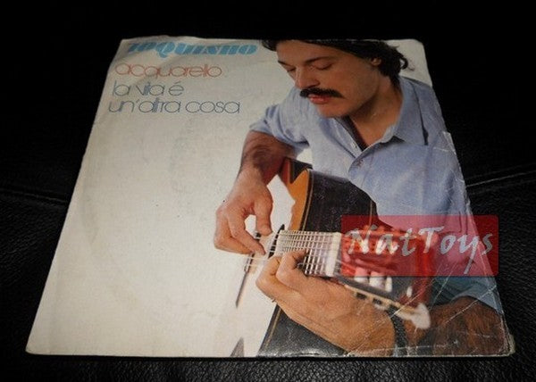7" 45 GIRI Toquinho ACQUARELLO/LA VITA E' UN'ALTRA COSA (1983, CGD 10459) VG/VG