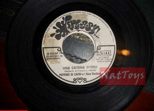 JUKE BOX 45 RPM P.Di Capri et les Rockers Une chaîne en or/Les Romains Envie de mer